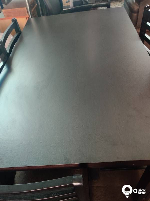 Wooden dining table with 6 chairs