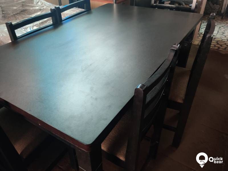 Wooden dining table with 6 chairs
