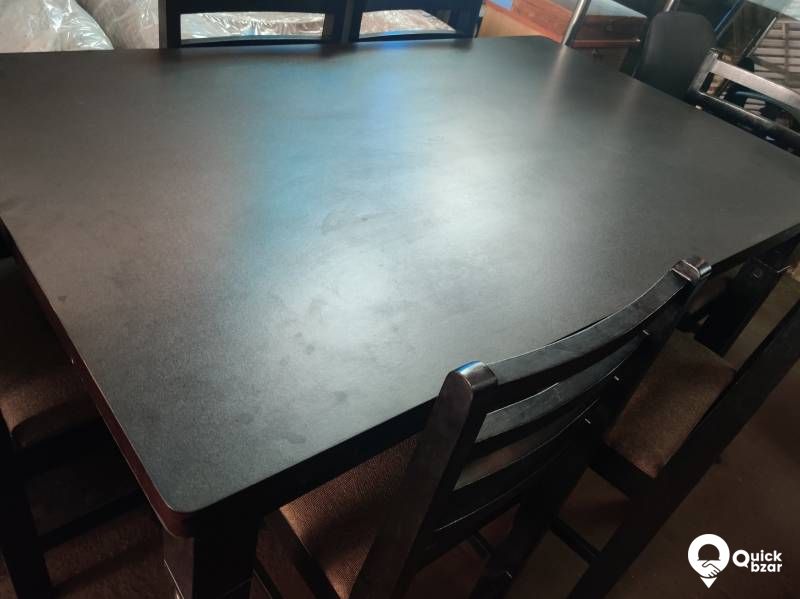 Wooden dining table with 6 chairs