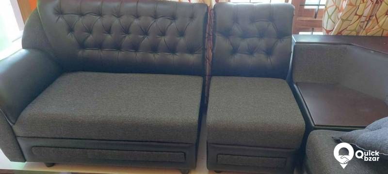 Corner sofa with teapoy