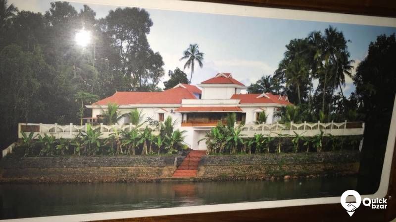 EKM dist location Ramanangalam big house water front property.